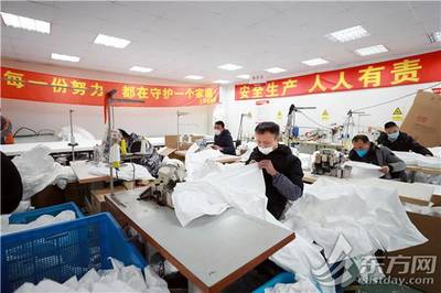 探訪上海防護服生產車間:5天從無到有 7天產能翻六倍