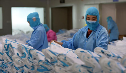 全民防疫物資生產(chǎn)忙 守護健康防護用品保供應